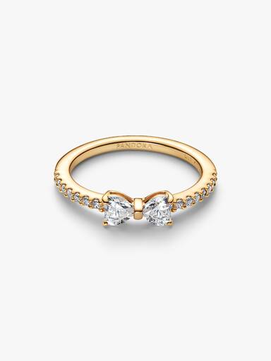 Sprankelende ring met heldere strik