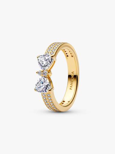 Sprankelende ring met strik en dubbele band