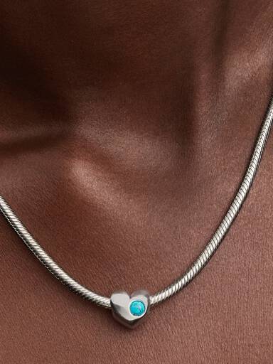 Graveerbare bedel turquoisekleurige steen hart