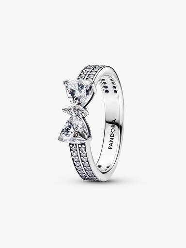 Sprankelende ring met strik en dubbele band